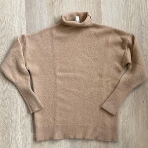 Babaton 100% Cashmere Turtleneck Sweater Tan Aritzia Minimalist Luxury Knit